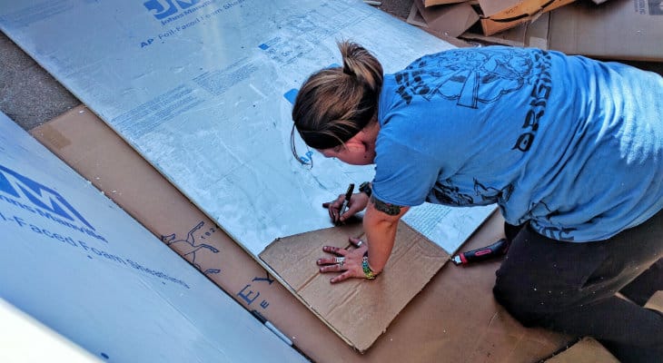 Tracing stencil on the foam insulation