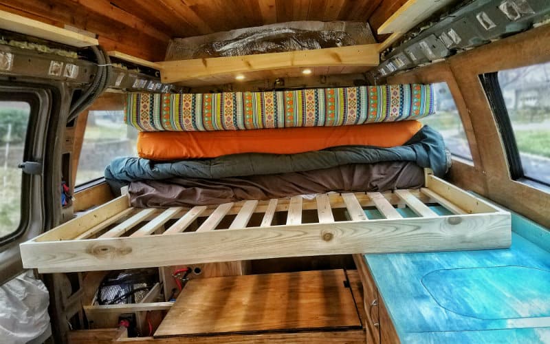 Pull out slat store bed van