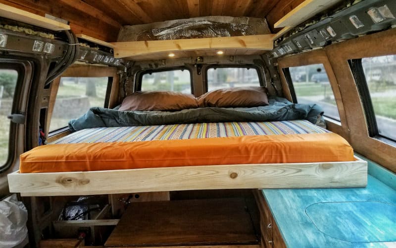 van bed pulled out cushions in