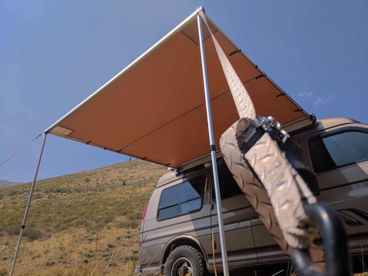 arb awning staked down against wind_1200x900