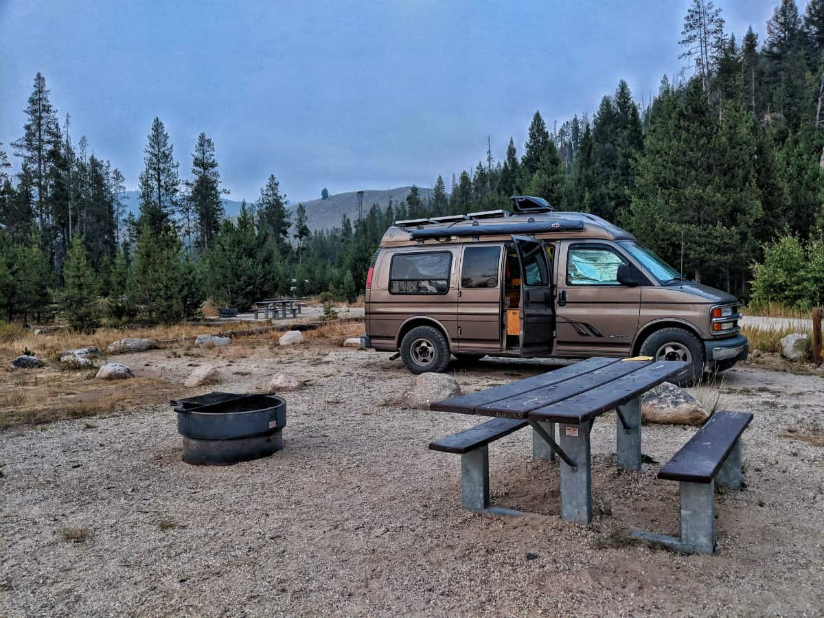 Van parked at a Forest Service Campground