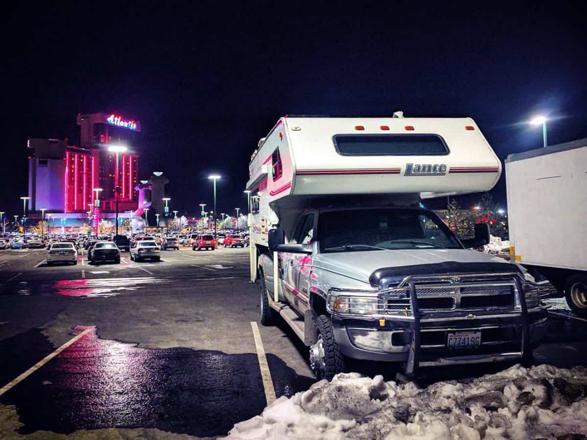Casino parking lots are an excellent option for sleeping overnight, like this truck camper parked at a casino