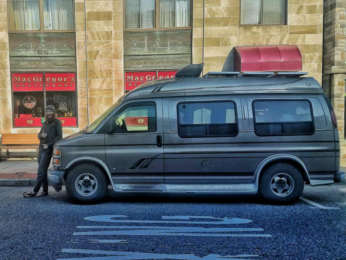 Van life camper van parked on a city street