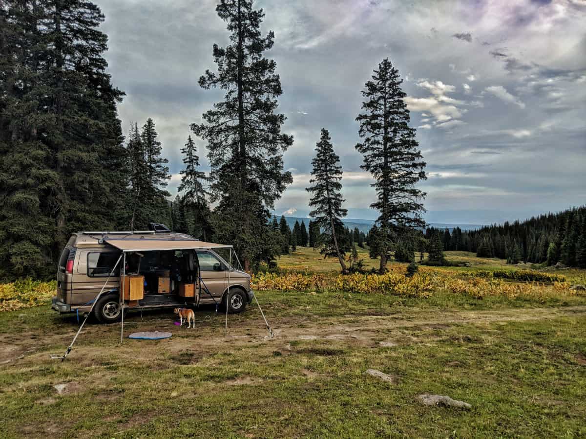 Where can you park overnight in your van life rig? One option is boondocking on public land, like this van camped out on Colorado's Grand Mesa