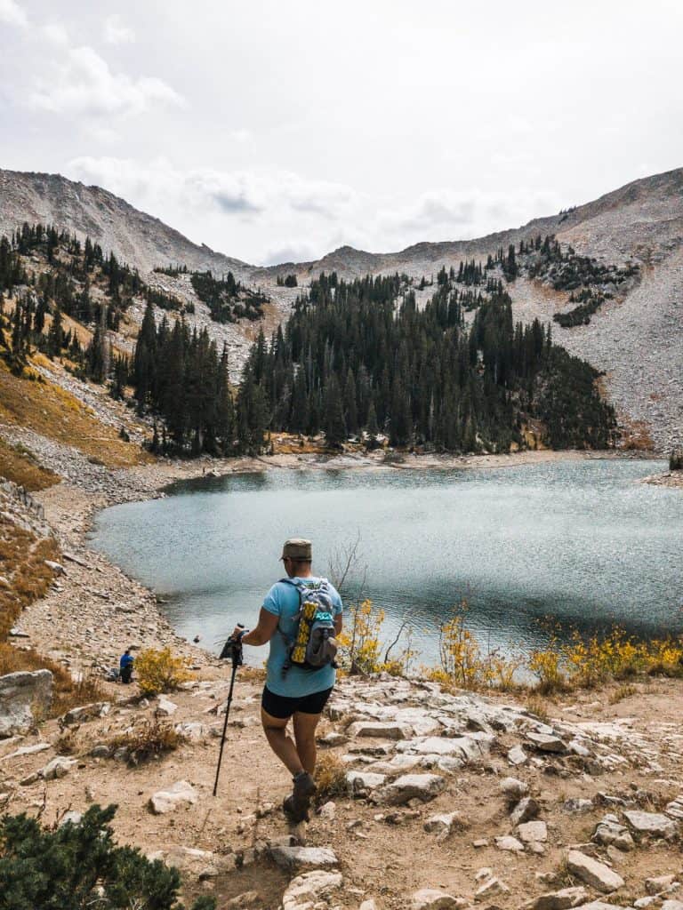 Hiking around a picturesque alpine lake.