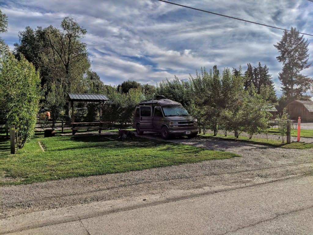 van parked at a campground