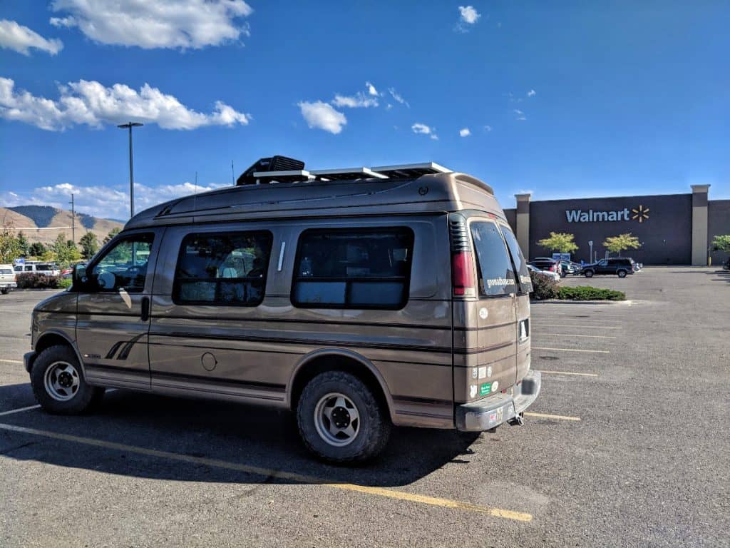 van parked outside of a walmart