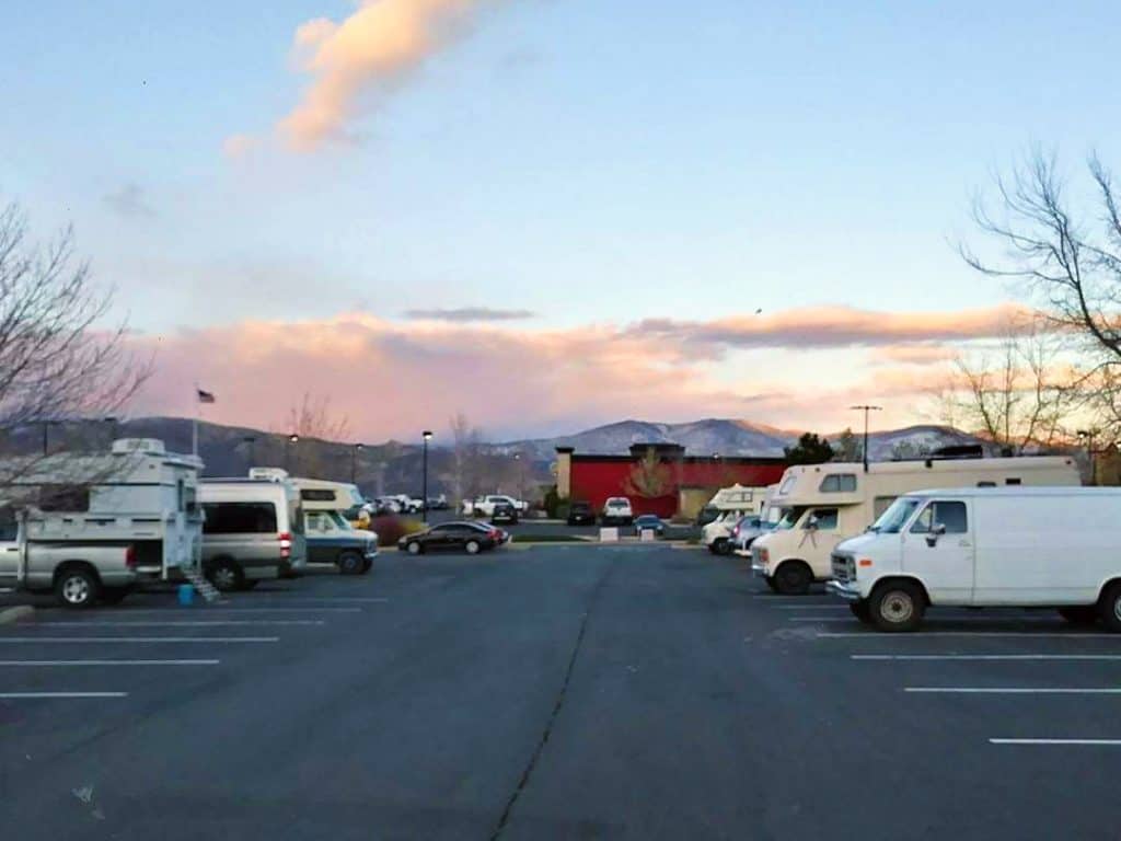 Vans camped out in Walmart parking lot