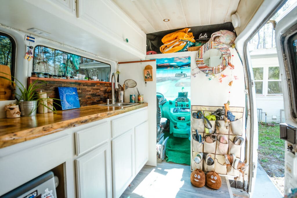 An interior shot of their kitchen and behind the driver/passenger seats.