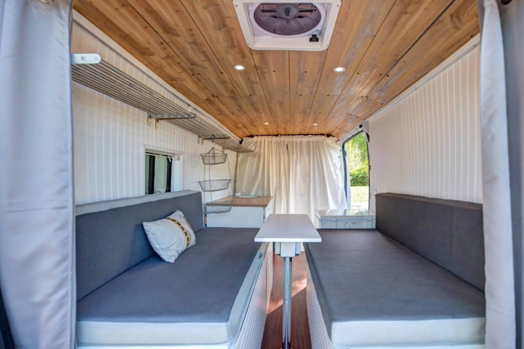 Back of promaster interior with kitchen table set up