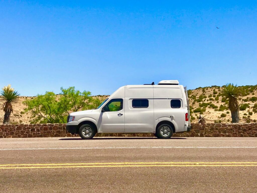 Exterior side shot of Nissan NV2500 van