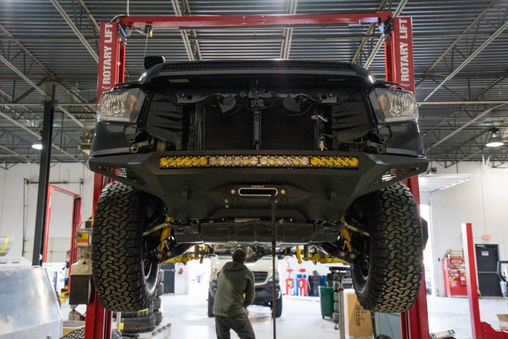 Toyota truck on lift without a front bumper