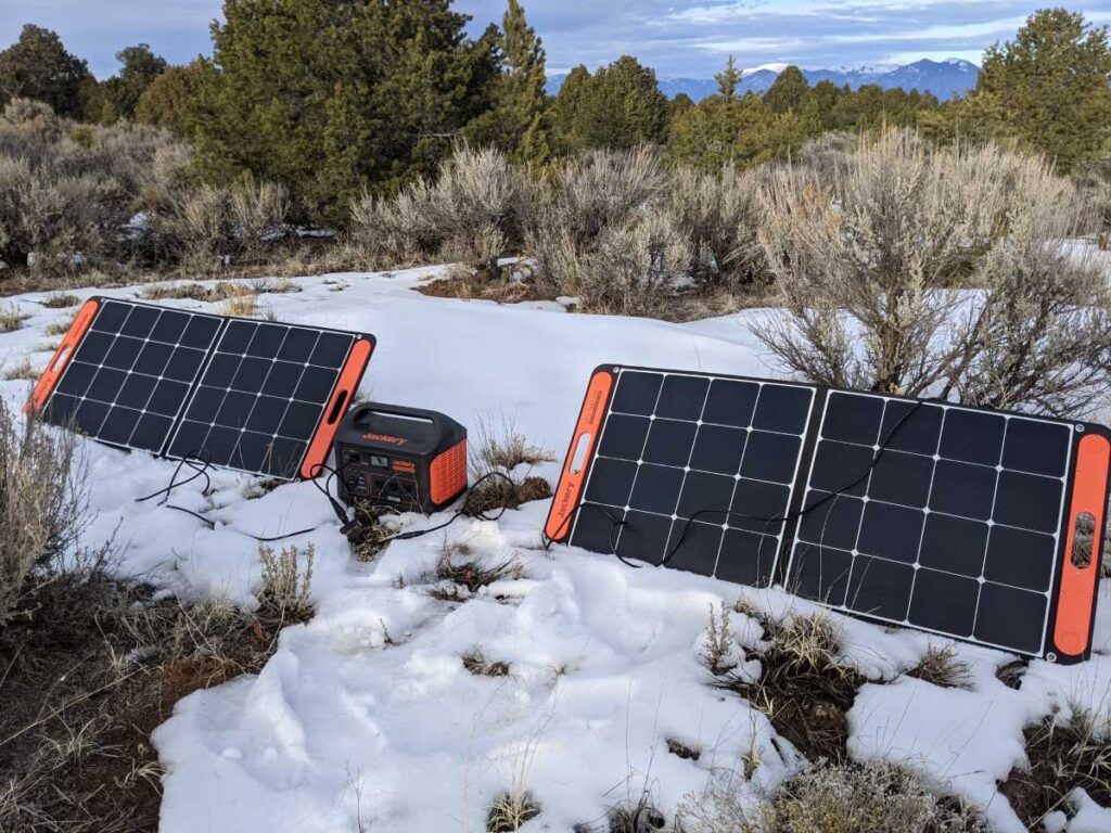 The Jackery Explorer 1000 being charged by two Solar Saga solar panels