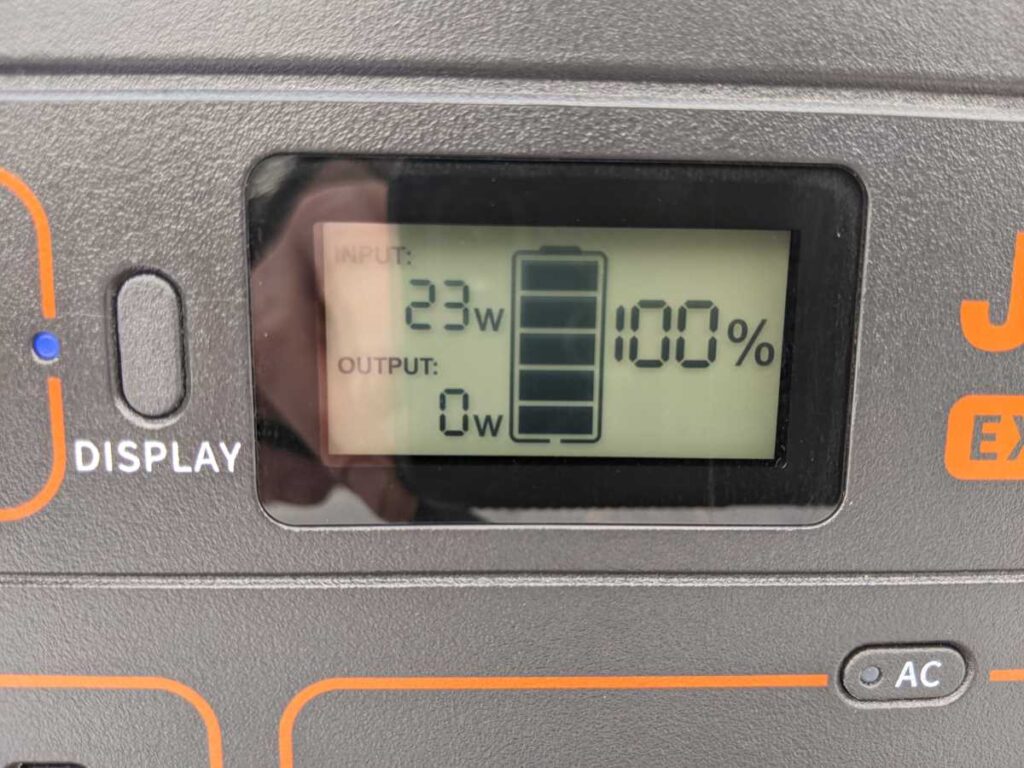 Close up of Jackery 1000 display showing watts, watts out, and charge percentage