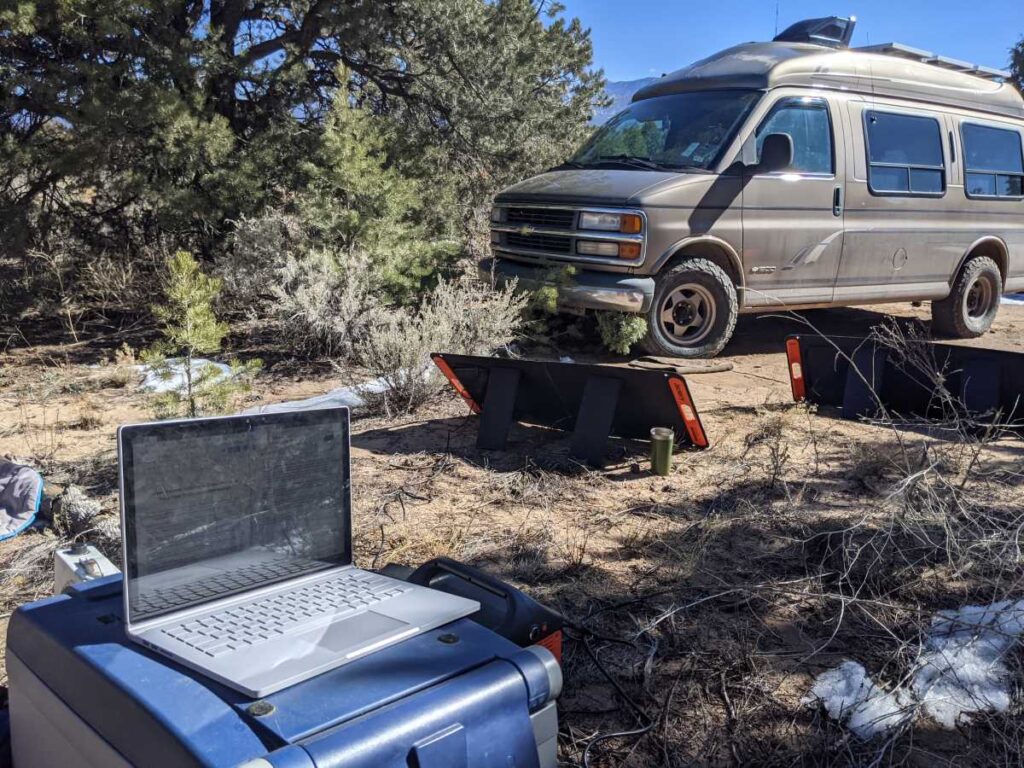 The computer in the foreground, then the SolarSaga panels, then Gnomie the Gnomad Home van in all his glory