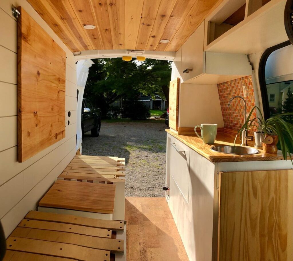 @eee_vanstagram Wood interior ford transit connect camper