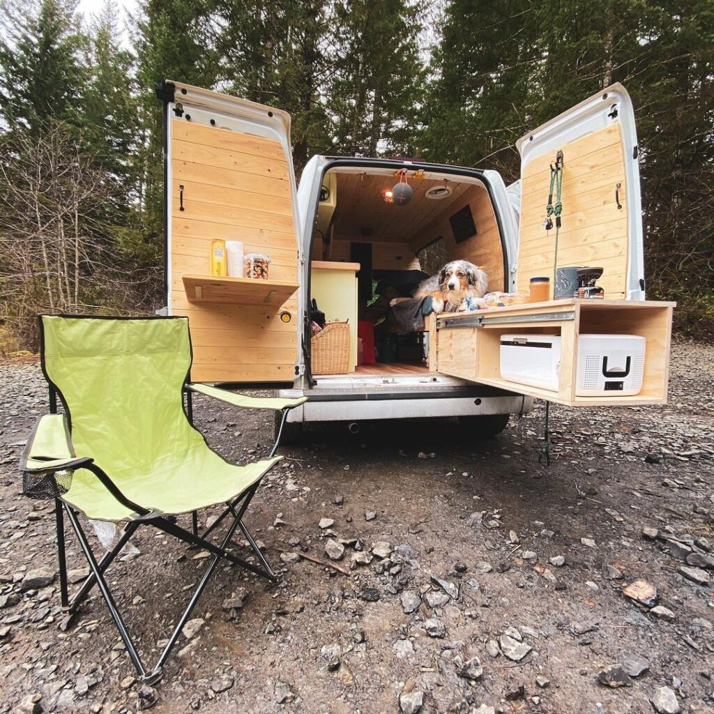 @milomeloy Transit connect camper with its back door open