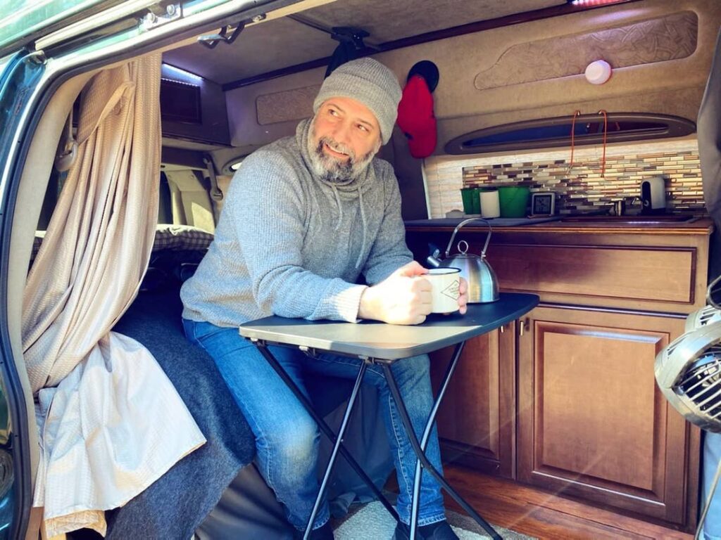 @isaacangel1 Drinking coffee in chevy express camper van