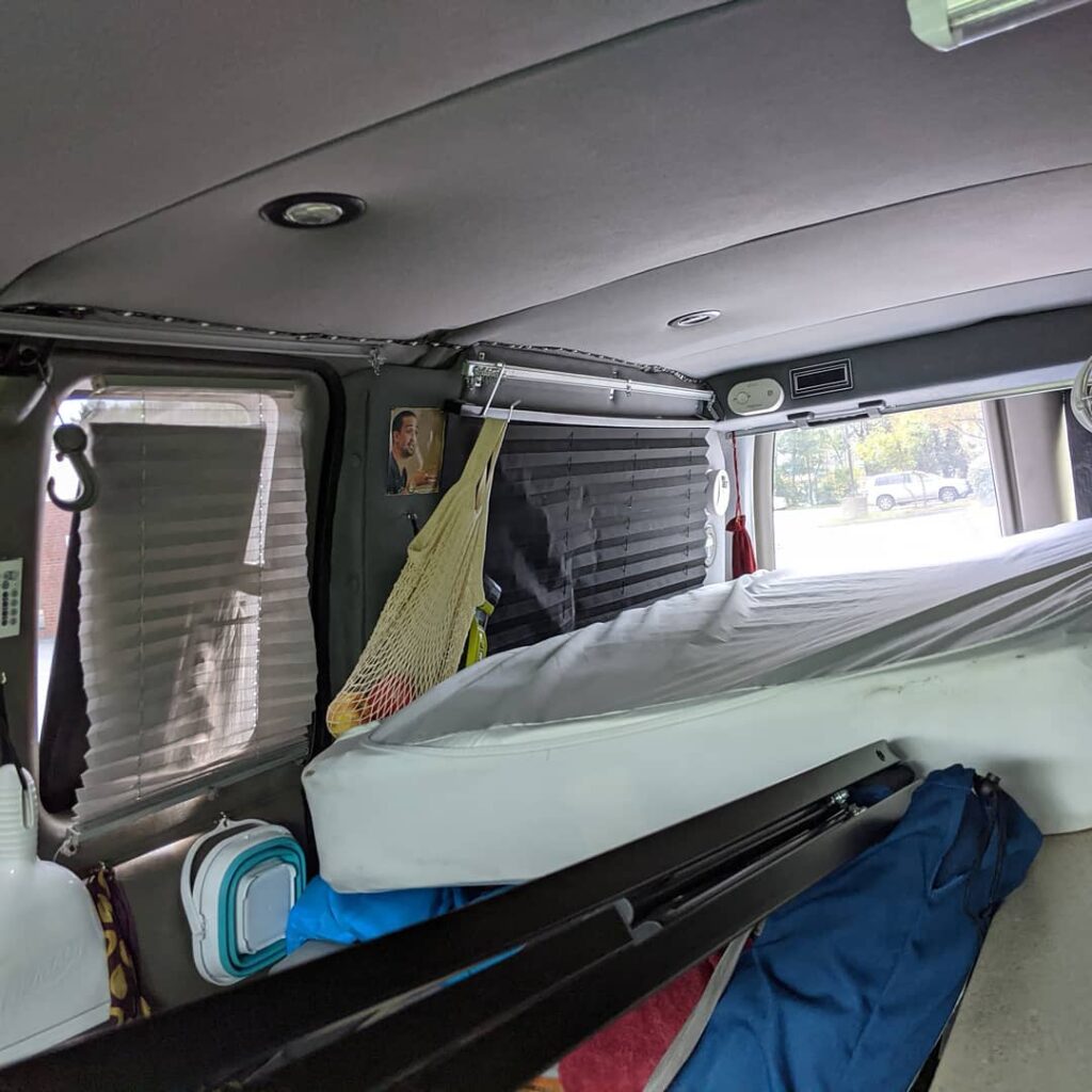 @thedawnofvanlife Interior of a chevy express camper van