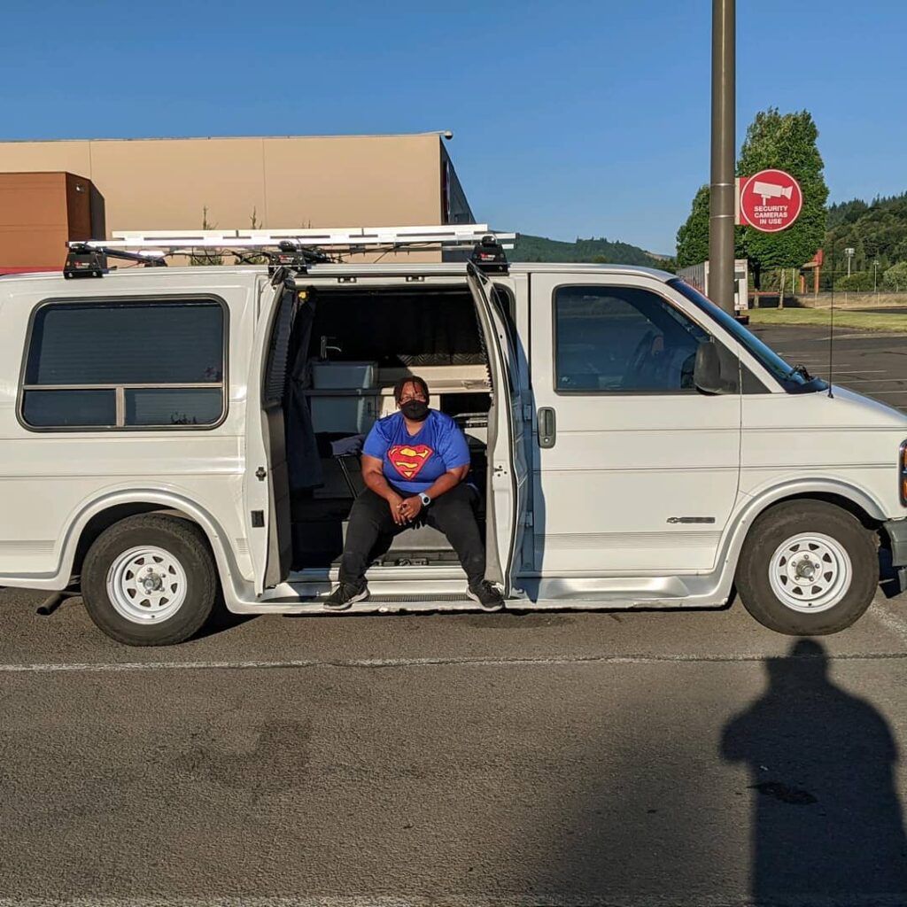 @thedawnofvanlife chevy van camper conversion side view