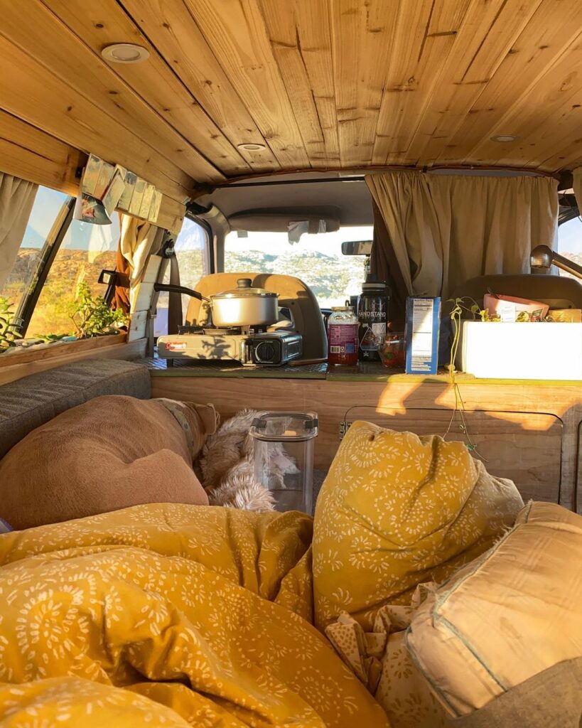 @adventure_time_loui Minivan camper with wooden interior