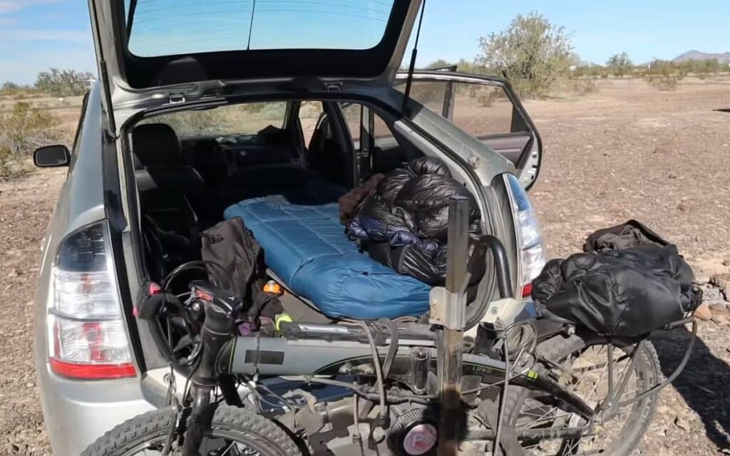 David's car camper with open back door, view inside