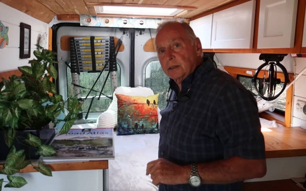 John showing the interior of his ram promaster camper van