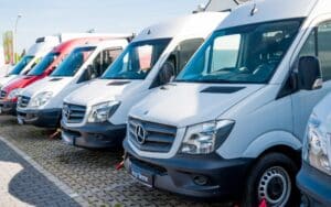 a line of Sprinter vans showcasing the best Sprinter van conversions for van life