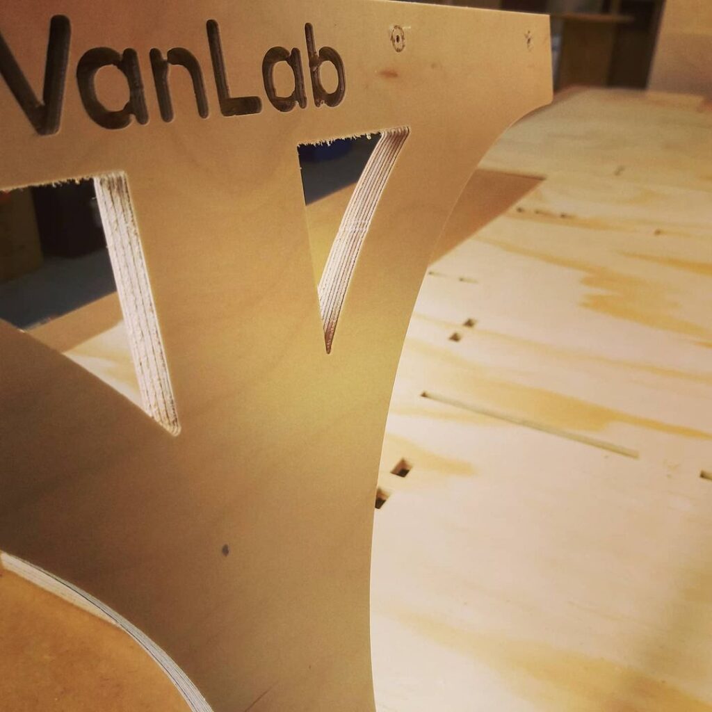 @_van.lab Vanlab logo engraved on wood