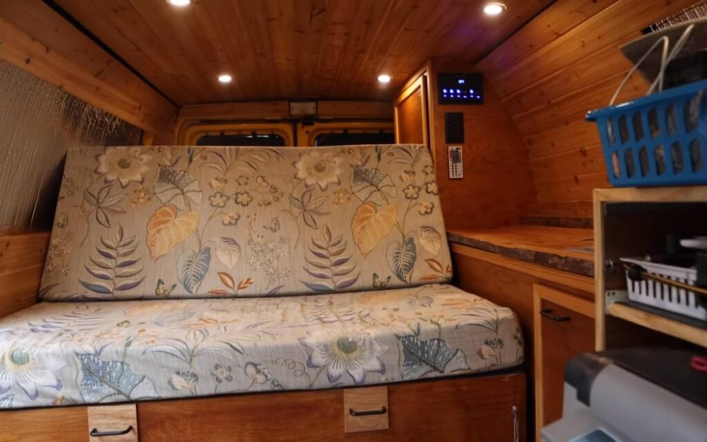 @andrewcranston cozy interior of a ford e series camper van