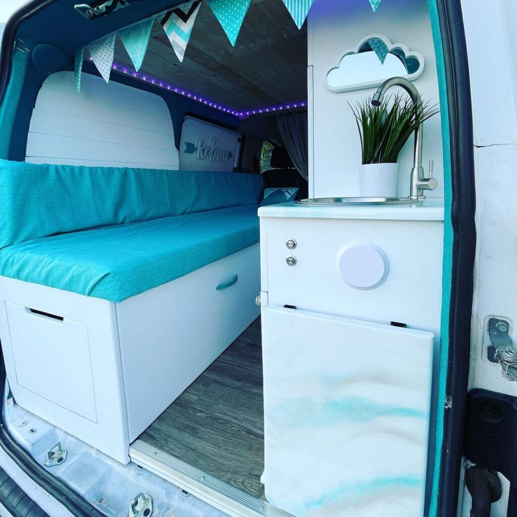 @happilytravelingeverafter White interior nissan nv200 campervan