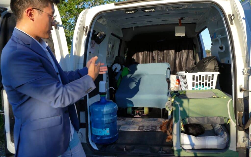 @jackislucky Man showing the interior of his nissan nv200 campervan