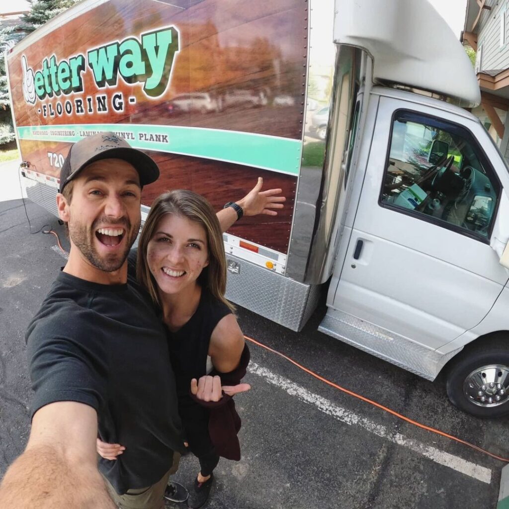 @boonboxers Couple taking a selfie next to their box truck camper