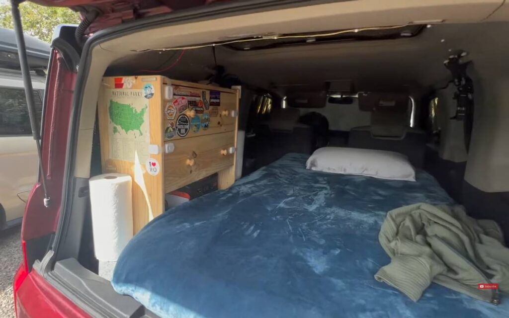 Hao's element camper with a bed inside