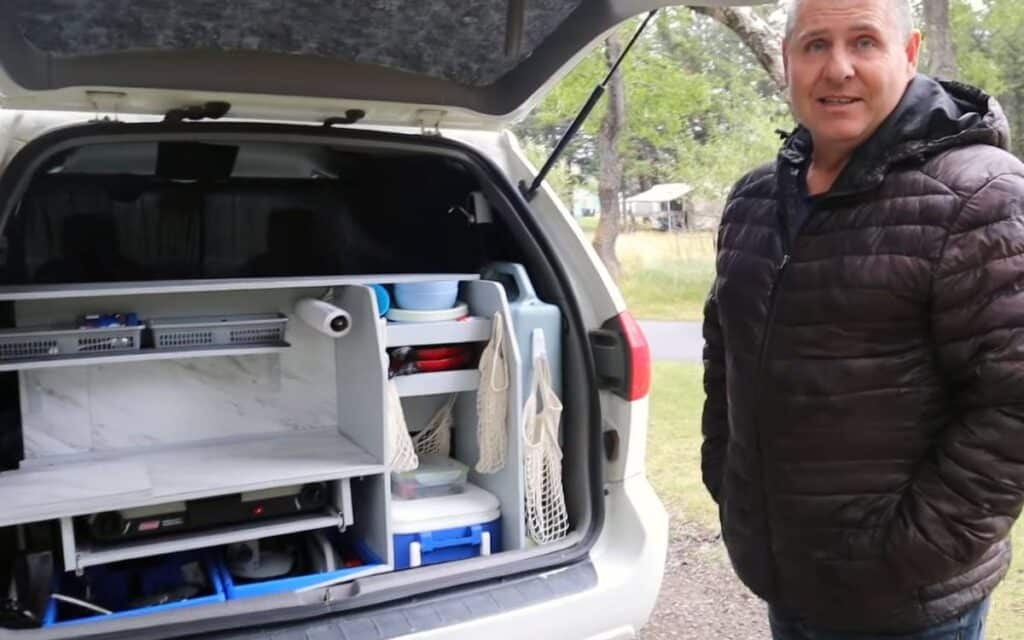 Lawrence showing his Toyota Sienna RV conversion