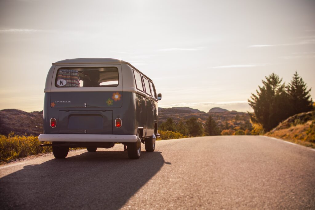 Blue and white van on the countryside road