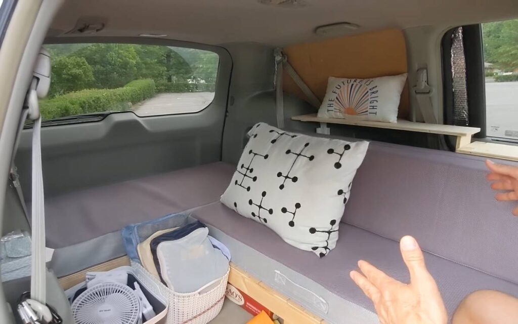 L-shaped sofa inside Kevin and Kanae's camper