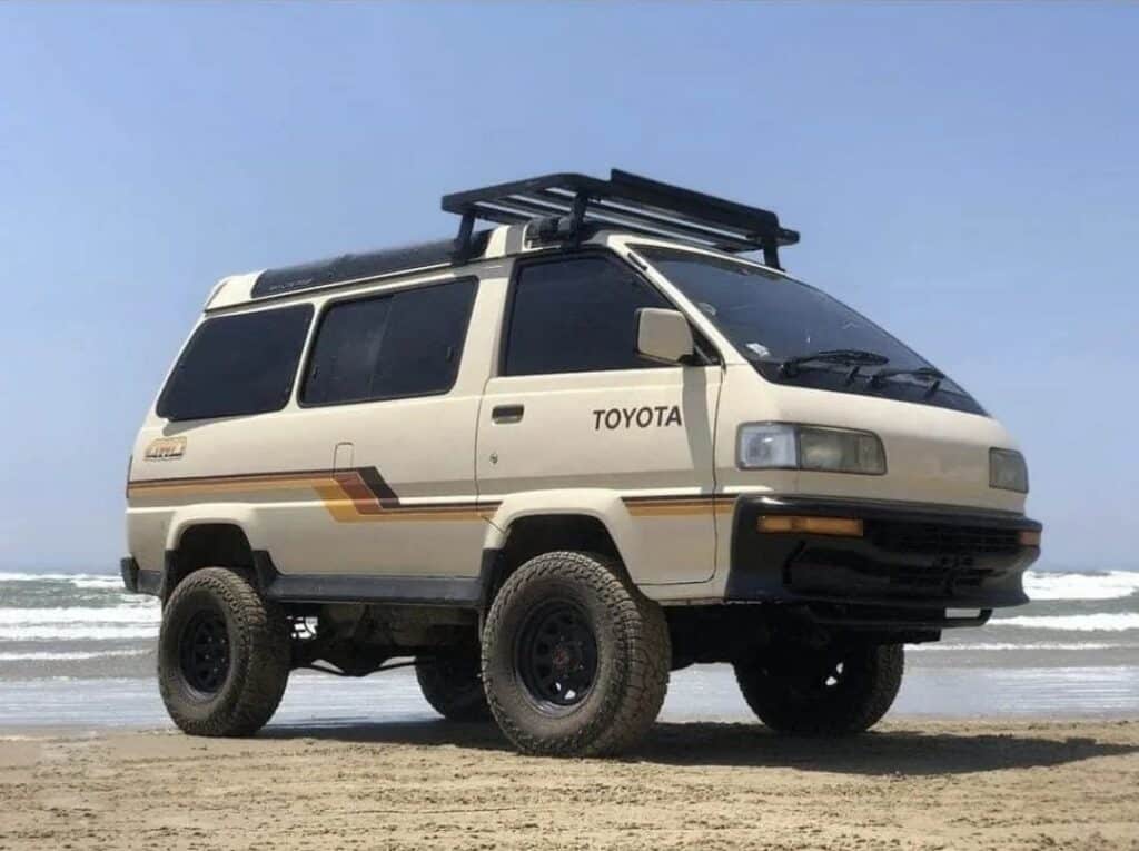 Toyota van on the beach