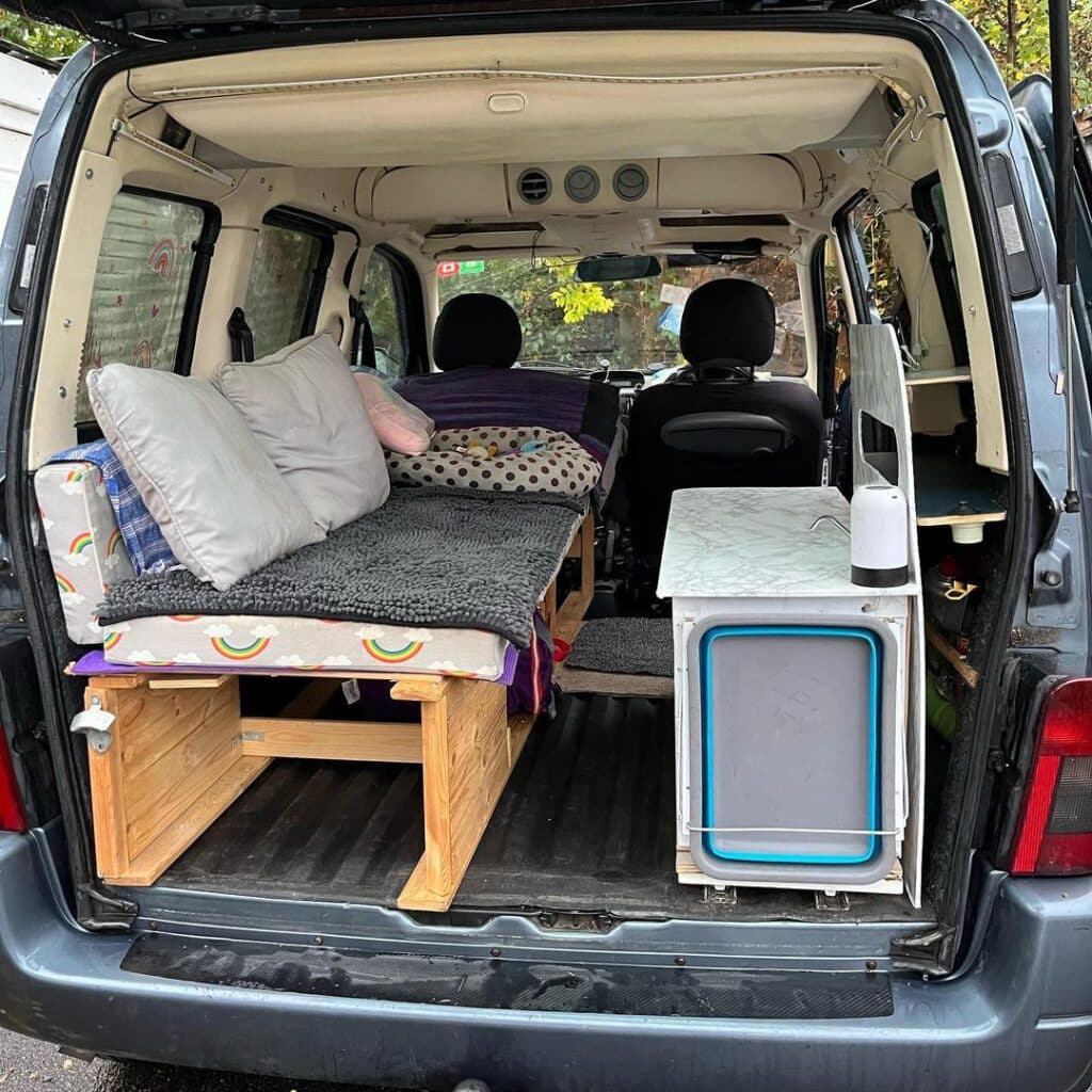 camper van interior with convertible bed