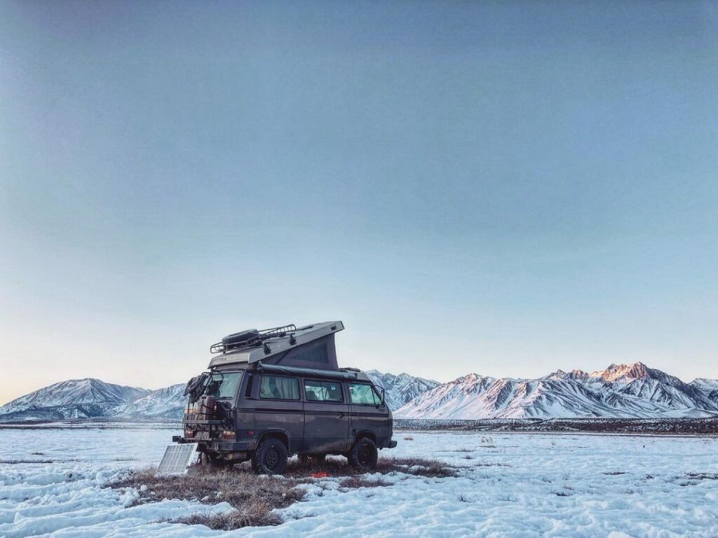 @blackforestwestfalias campervan rentals camper parked near snow-covered mountains