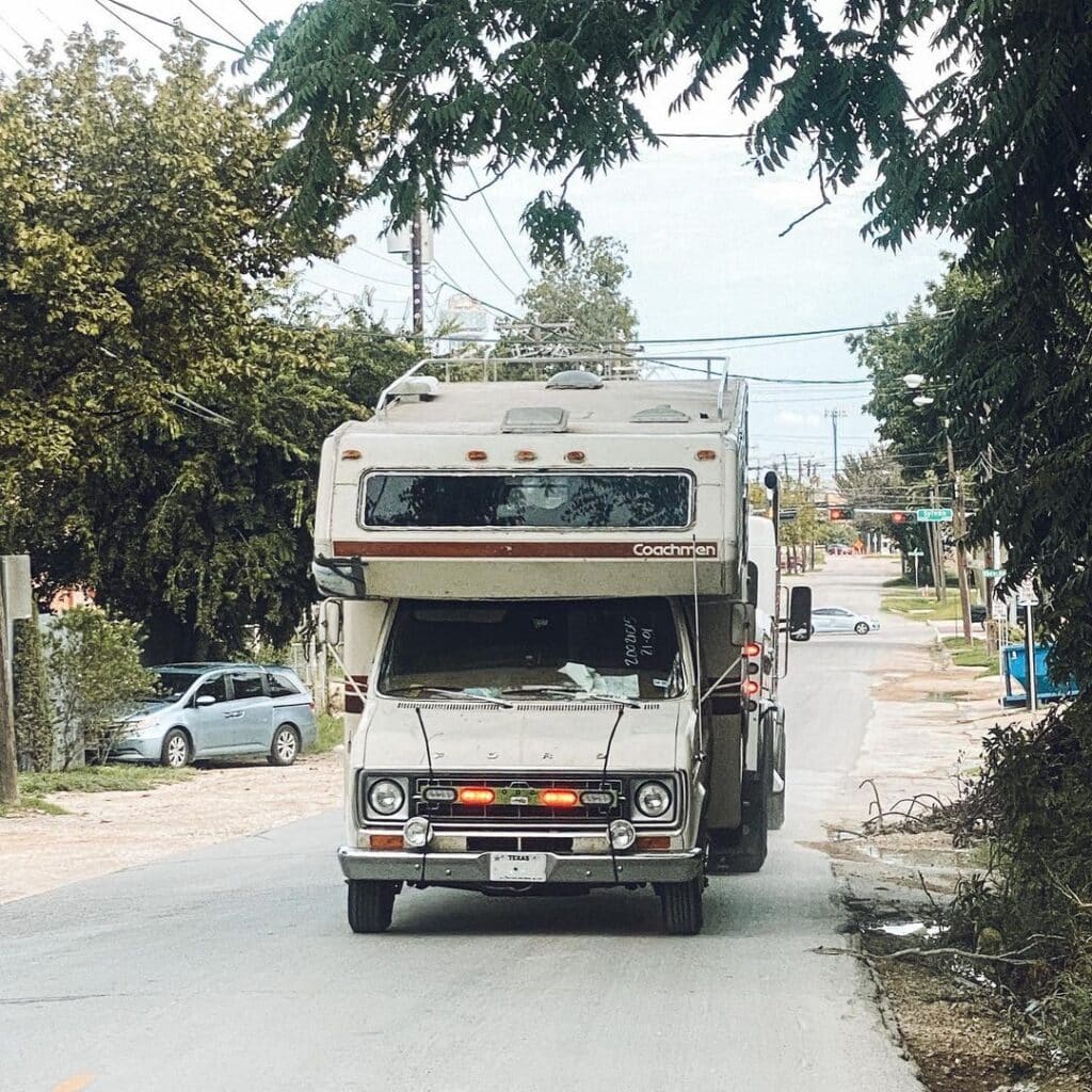 @doesthiscountasvanlife White RV on the road