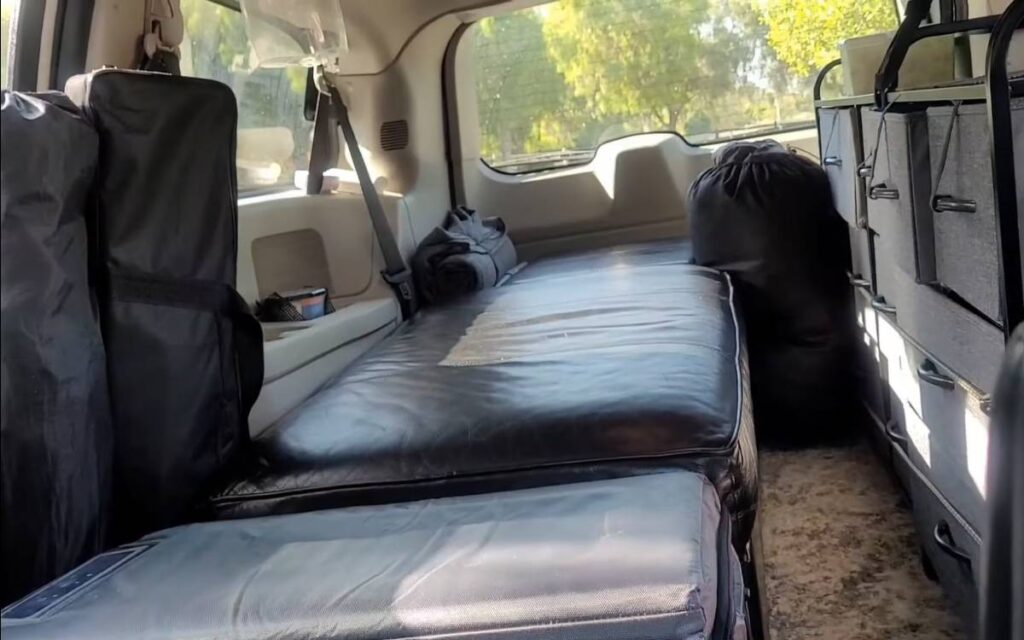 @elaine.lombardi Dodge grand caravan camper interior view from the front seat