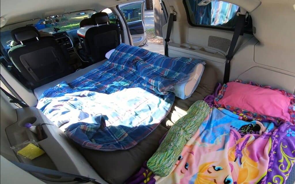 @fullnester9456 Two mattresses inside a minimalist camper