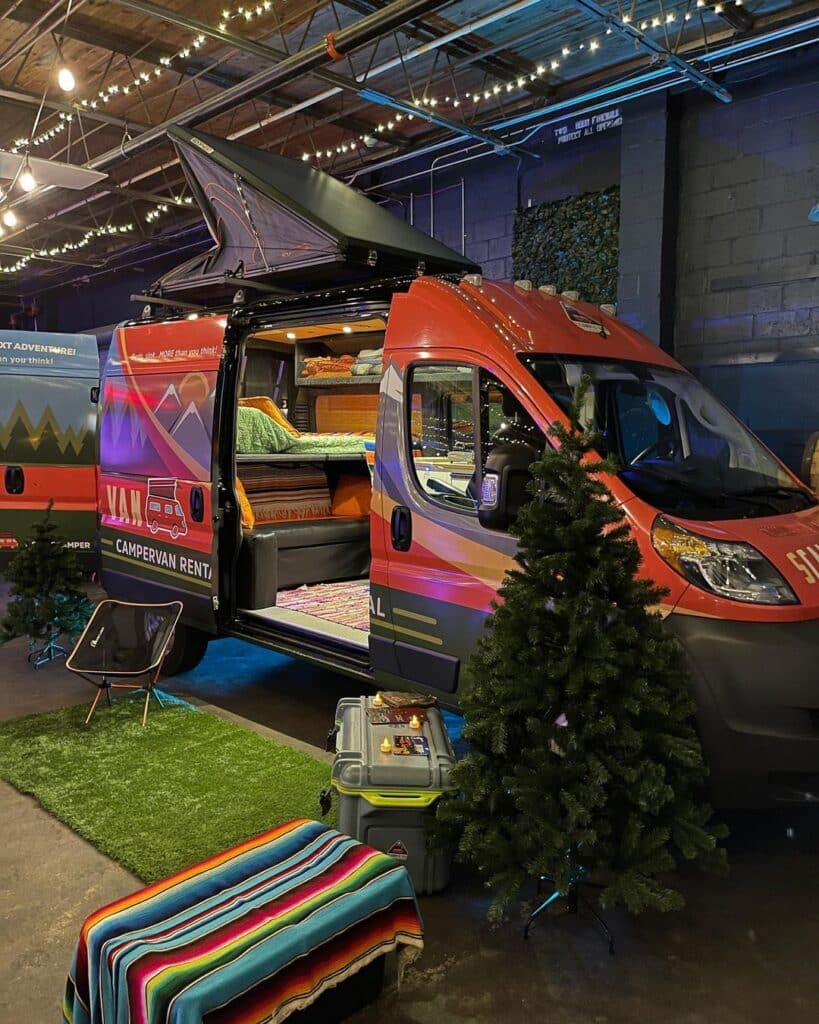 @scampervan campervan rentals camper displayed in an event