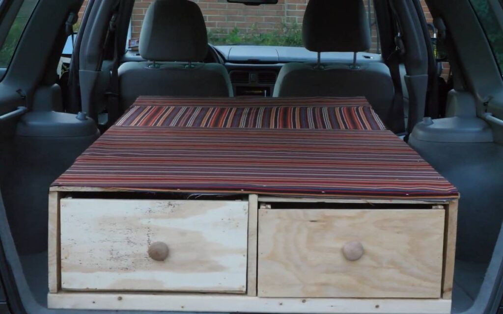 @thearter12 forester conversion camper bed with two drawers