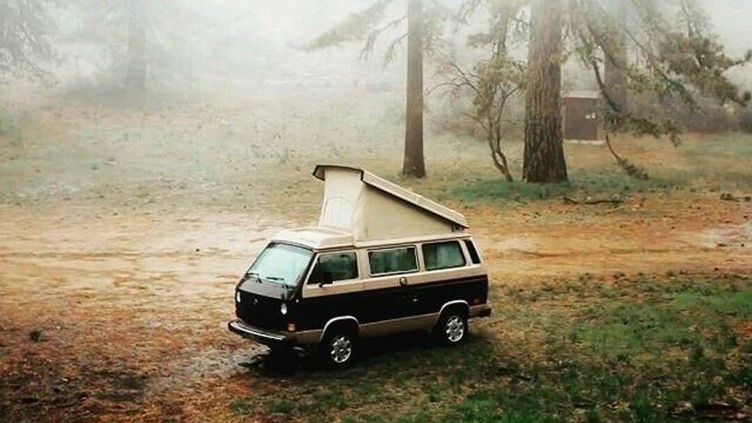 @travel.by.minibus VW bus camper parked in a foggy forest