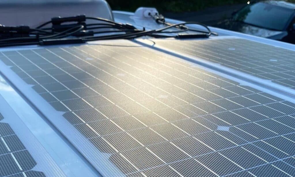 Flexible camper solar panels mounted on van roof