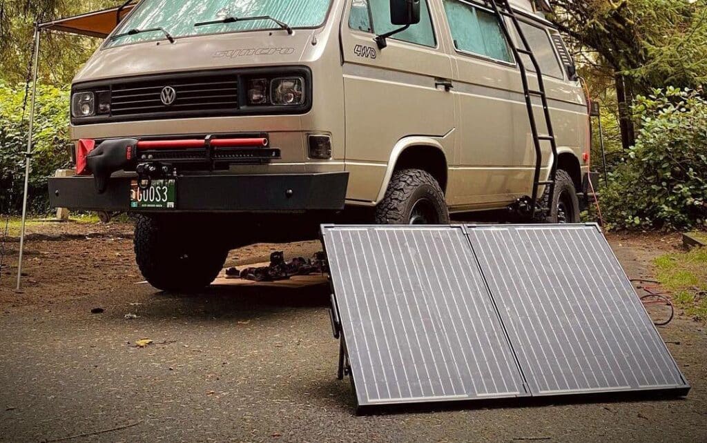 portable solar panel in front of vw syncro camper van