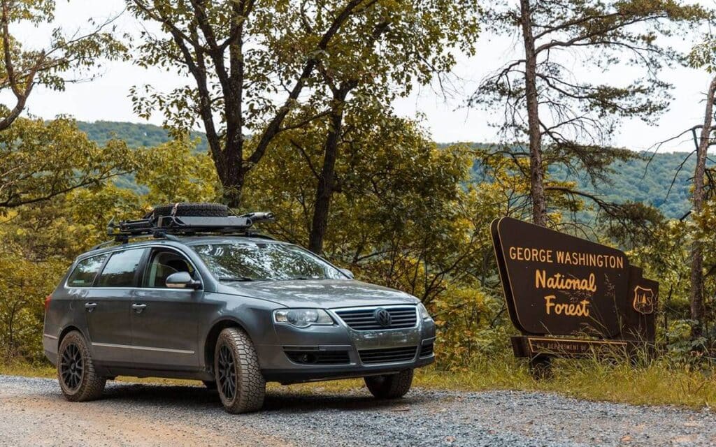 @hugoverland Black camper parked at George Washington National Forest