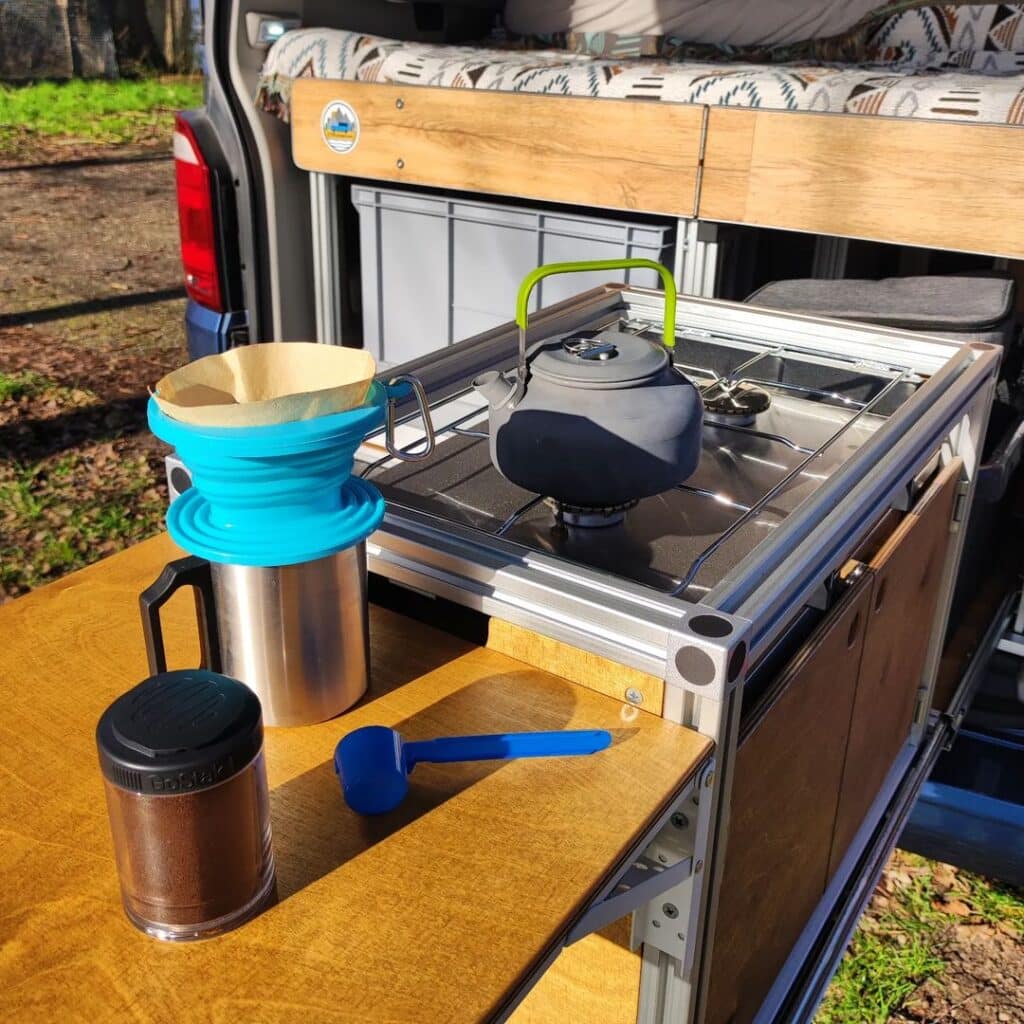 This ultimate pull-out kitchen adds stoves, grills, prep area, and storage  to your VW camper van - Yanko Design